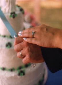 Bride and groom cutting the cake